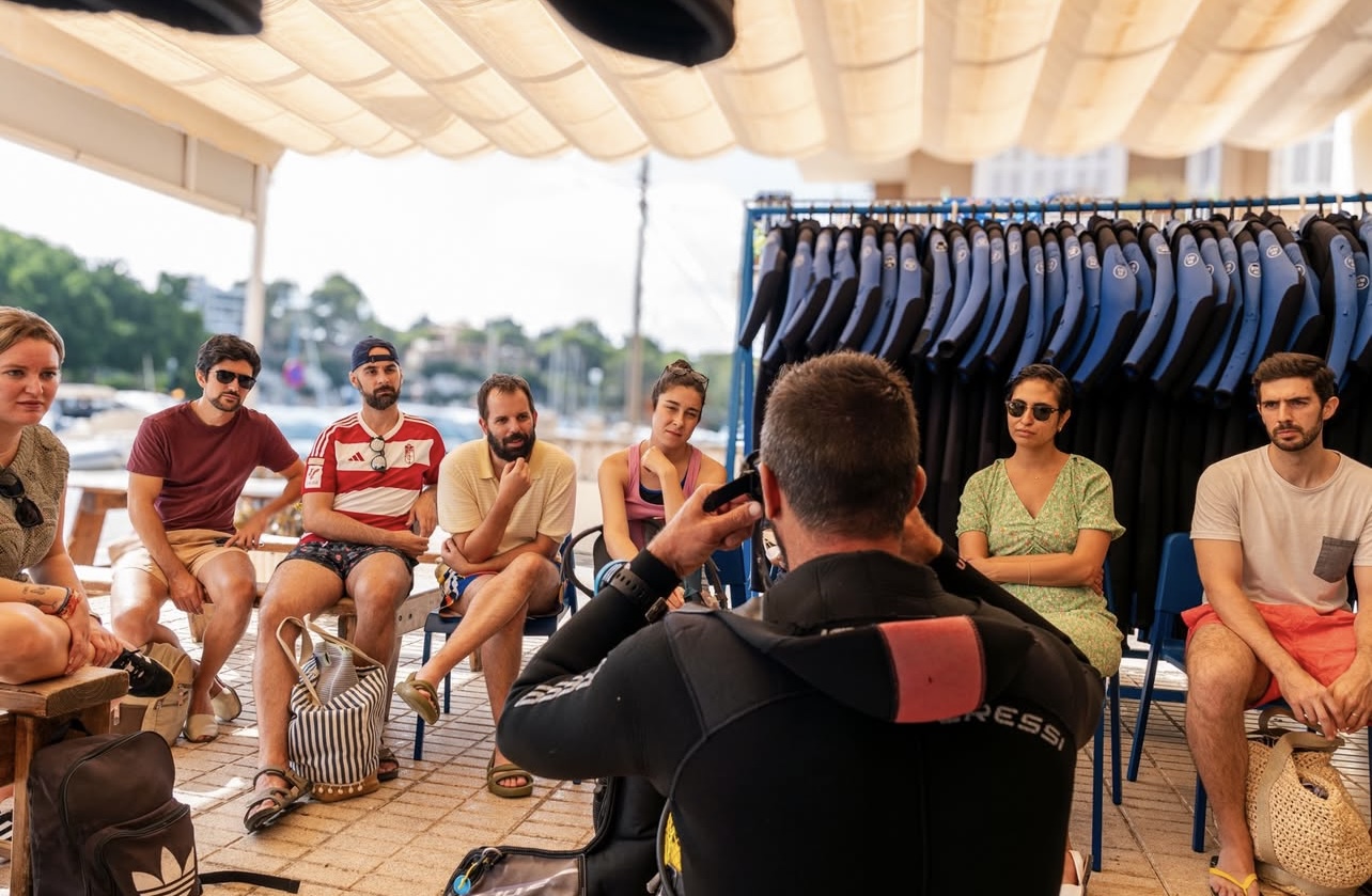 Group briefing at the dive centre in Porto Cristo harbour